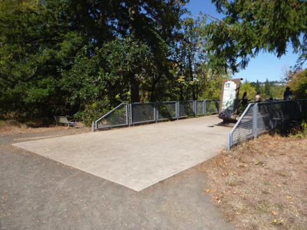 River overlook at Tualatin River - transition from gravel to concrete pad may have a lip - interpretive displays